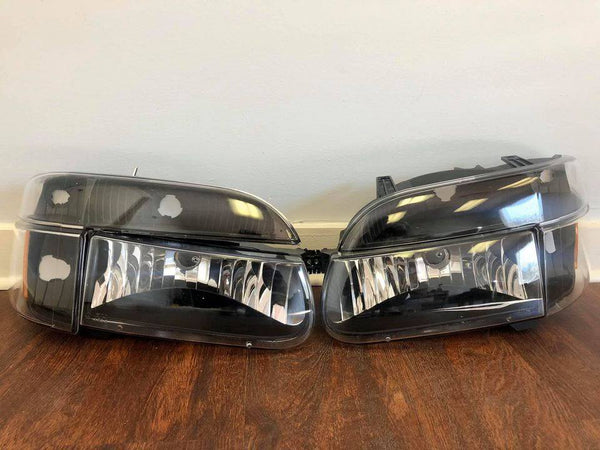 Headlights 4Piece Black Fits 95-01 Ford Explorer/97 Mercury Mountaineer