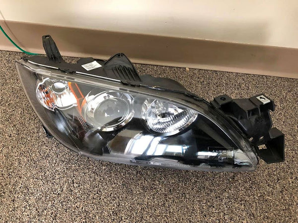 Mazda 3 Passenger side Headlight